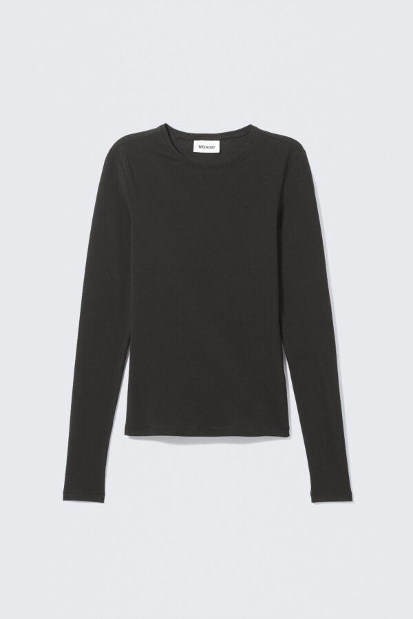 Manga larga corte ajustado